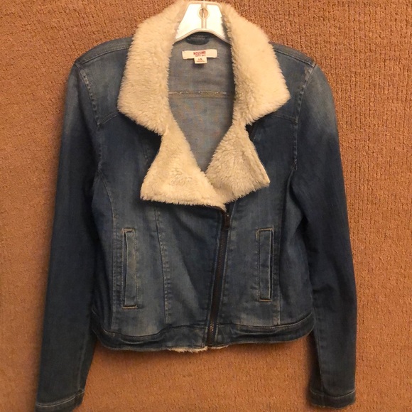 jean jacket with fur around the collar
